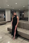 It was the perfect length (I am 5'8" and wore heels with it), the material is super high quality, and I loved how it was so simple but also unique with the low cut back on one side and high neck. I have a small chest and am very tall, and this dress fits perfectly - worth every penny! :) - Ava V.