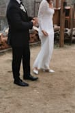 After ordering a few dresses, I fell in love with this one. The lace sleeves are a dream, and it just flatters my body. The open back is just beautiful, and it fits true to size. Can't wait to wear it on my wedding day! - Vanessa S.