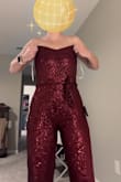 I bought this jumpsuit for my 40th birthday party. I was in love, but unfortunately, the torso on the jumpsuit was way too short. I couldn't pull the top over my chest. I even ordered the large hoping for more length in the torso, but not enough was given. The length for my height was great in the hem, but just too small otherwise. - Angela J.