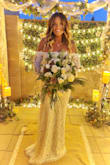 This is not my first wedding. I purchased several dresses from different websites and the minute I tried this dress on, this was the one. It fit perfectly, no hemming was needed. My husband was blown away by how beautiful I looked in it. A beautiful, elegant dress and easy on the budget! - Sheri P.