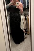 I ordered this dress and it came just in time. I'm OBSESSED with the feathers on the skirt. I got so many compliments all night! - Angela D.