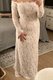 Beautiful dress overall! I am 5'7 and was the perfect length for me but I wouldn't be able to wear high heels. The lace is nice, however the arms are very restrictive but that's normal for a dress in this style. It does not have boning or cups on the inside, so the top is just tight on your chest. It moves down a bit and needs adjusting. Ultimately, not bridal enough for my elopement so I returned it. It's worth it for a casual elopement! - Marwa N.