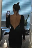 Love the back. It's very slimming. It's a thicker material than I thought from the website photos. - Sarah B.