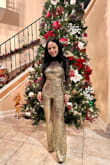 This jumpsuit is stunning, fits like a glove! I did have to get the hem adjusted because it was very long, but I'm on the shorter side so that was to be expected. Wore it for New Year's and felt amazing! - Karen R.