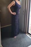 This dress is beautiful! The quality of the dress is great! The dress fits, and is true to size! I love the feel of this dress! I am 34 DDD, so I was worried about that. It fits great. I will probably wear a strapless bra on the day of the event. No bra in the photo. I hope this review helps others choose this dress for their event, and helps you decide what size is best for you! - Crystal F.