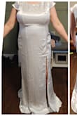 I followed the size chart and ordered the XL. I was worried it would be too tight in the bust but it fits great! I won't need any alterations to adjust the fit. It did come out of the bag pretty wrinkled. I'm hoping a dry cleaner can get that out. The front looks more matronly than I expected but for the price, I can get alterations made to adjust the style. Overall I'm pretty pleased. - Shahna B.