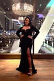 It's absolutely stunning! I received so many compliments. The fabric has a little bit of stretch so get your true size. I'm between a Medium and a Large and got a large because I'm a 34DD. You can go braless, but I used boob tape and it doesn't show. - Roshni S.