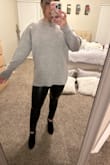 I got this because of the inspo with the leather leggings on here as well. This sweater did not disappoint!!! I'm a true size medium and it fits just how I wanted it to. A small would have been too small and a large would have been too baggy for my taste. This is already loose. I'm 5ft tall and a 34DDD and this is also a good length. Especially for leggings. It's also really warm!! - Devi L.