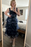 I bought this dress for a dear friend's wedding celebration this March. The dress fit perfectly, I ordered an XL even though I usually wear a large in dresses. However, I'm glad I ordered an XL because for this dress it fits perfectly on my body. I love the ruffles and where they hit on my body, they do all the right things! This dress fits the theme of her wedding perfectly and will be a wonderful addition to my dressing up wardrobe for other future events! The picture is from right after I opened it -- can't wait to wear it and show it off at the wedding! - Cynthia F.
