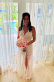 We quickly planned a destination wedding. I ordered many dresses online due to timing. This was my first arrival. I loved the dress for a beach wedding! I didn't love the back straps because it made unflattering bulges. Being 52, I also felt it came "too low" in [the] back for my age. There is absolutely no hold in the bust area. Dress is long. Found another dress but ended back at this dress because those who saw it said "You have to wear it!" My daughter suggested minor changes. With a week to go, cut the straps to make a halter, took the material from length and made a tie in back, left the hem fresh cut, added cups, and didn't even need to wear a bra! (Adjustments to dress: $70). The dress packed nicely. The dress was PERFECT! I received so many compliments from guests on the resort. The wedding coordinator commented she has seen many dresses but none quite as elegant, beachy, but sexy as this. I felt like a million bucks in it. If you're hesitating on this dress, go for it! You won't be disappointed! - Joyce F.