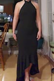 From the moment I put this dress on, it felt perfect! The material is thicker but not heavy and there is a light liner that covers the bodice area keeping the lower half free to move. The upper half fits nicely and snugly and I feel comfortable not wearing a bra, which helps with the open back. The closure around the neck is with 2 buttons but is easy to attach. I purchased this one and another ( which I will review as well) and it will be down to the last minute to decide which one I will wear for a wedding in May. I love them both so I'm keeping both for future events as well. - Lucy H.