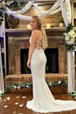 This dress was amazing. I'm very short and the dress was still perfect. I wore it for my very small impromptu wedding ceremony and this dress arrived in 3 days. 10/10 recommend. - Kendra L.