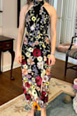 I LOVE this dress! Haven't worn it out yet but tried it on and am very happy with it. I don't love the hemline. I wish the flowers weren't cropped, and because I'm short, the tea-length hem hits at an awkward spot. But otherwise, the fit and material is amazing. The xs fits me perfectly in the morning, but the material isn't stretchy and is a little too tight when I have a food baby in the evening, so I think I'm in between sizes. Regardless, I love this dress so much and am excited to wear it out! - Emily T.