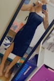 Adjusting straps doubled in the front and were sewn unevenly and backwards. Dress is longer than expected. Zipper is too heavy and clunky for this type of dress. Fabric folds; material is not the most pleasant. - Kaley B.
