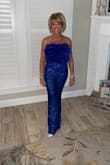 This outfit was amazing! It fit me perfect! Very comfortable! I got so many compliments! My only complaint is the sequins on the inside of my legs would catch together, but that is what happens with sequin pants! I would definitely recommend this, and I would buy again! - Liesl K.