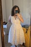It was cute, but the fabric was really stiff and the color of the undergarment was very pink. It didn't look like my color at all because I'm browner, and it made it look cheap. I bought a larger size so my breasts would fit; they did, but it made the waist too high. - Zoe K.