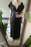 It just wasn't my favorite neckline/wasn't flattering on my body (maybe need a bigger bust to fill it out better). Shame because it was long enough for me and the back was super cute. - Dorothy-Faye S.