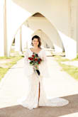 I am in love with my dress and so was everyone else! People even asked if it was custom-made for me. Beautiful & elegant with a little twist. So many compliments! - Haley W.