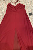 The dress is gorgeous and I love the cut and material. HOWEVER, the slit was straight down the middle of the dress, centered under my chest. Privates were completely exposed... I exchanged the dress (thinking it was a design error) and got the same problem on the second dress. Idk if its only an error for 1X+ dresses, as many reviews clearly had a  slit on the leg, but I had to return the dress. - Grace E.