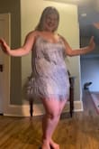 I never want to take this off! It's so comfortable and pretty. It's incredibly over the top and perfect for my disco birthday party. The straps are adjustable. It's a bit short, but the fringe makes it feel appropriate. - Kimberly F.