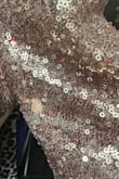 Dress is beautiful; the only problem is that the sequins kept falling off. I don't think I will use it ever again; it's one of those that you only use once. - Nora H.