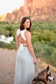 This top is amazing! I wear it with skirts for a dressier look or jeans/shorts to dress it down. Sits right at the belly button for a perfect cropped look. - Alexandra U.