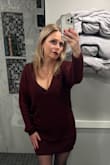 Love this sweater dress. I got the mediums so they are oversized and love the deep V in the front. Wore the burgundy on Christmas Eve and my boots matched perfectly with it. Can't wait to wear the green, it's my favorite color. I actually bought the black one 2 years ago and it's still perfect. - Lynn