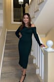 I recently purchased this dress for an NYE party and I got so many compliments. I love the off-the-shoulder style and the thickness/quality of the material. It's stylish, yet so comfy and warm which is perfect for those colder winter months! - Sabrina M.
