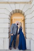 I bought this dress in a size small 2021 in navy for my engagement photos and absolutely loved it! I have since had a baby and am a little bigger, so ordered it in a size medium green and am equally as happy! The material is heavy and hangs beautifully and I feel very secure in this dress! The wrap does not feel like it will come undone and gives you total flexibility on the cleavage and the slit! I will be wearing the new green one to a wedding in February so I do not have a photo of that dress yet, but here is the navy small! - Brielle S.