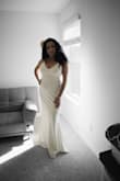 I had been shopping for a classic and elegant wedding dress for a while until my fiance sent me a link to Lulus. The dress fits perfectly, the fabric is soft, thick, and a little elastic so it is not transparent and it fits my body comfortably without worrying about gaining or losing weight. The color is beautiful. It came in time and without any hassle on the day that they promised. The dress came in a box with a bag included and a card. So professional. I will buy more dresses from Lulus. - Marisol M.