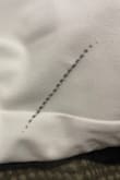 Pants came with a huge black line on them - Kadie S.