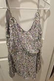 This romper is very comfortable. It runs a little large, especially at the top, so be careful while ordering. It is as beautiful as the pictures. - Britzy M.