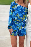 I don't think I wore this to the actual wedding, but I wore it to the cocktails the night before. It's cute... Bright! I have both the orange and the blue one. Can't wear a bra, so I wore the stick on "petals". I also wore it "off one shoulder", as opposed to the way I think it's supposed to be worn. - Christy N.