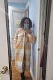 I was a bit nervous to get this, considering there were no reviews, but overall, happy with my purchase. Nice statement jacket, warm enough when layered with a sweater for 47-degree weather and up. - Stacey S.