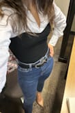 I think this top fits like a glove. It looks sophisticated yet cool. It paired with a skirt or jeans and a messy ponytail, you will be a trendsetter in the office. - Emily K.