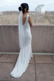I'm so thankful Lulu's provides brides with beautiful and affordable dresses that made me feel stunning on my wedding day. The material for this dress was so comfortable to wear and hugged my figure in all the right places. I'm petite, so I did have to tailor the dress. I hemmed the front, without touching the train in the back, and had to shorten the sleeves. Once those adjustments were done, the dress was perfect! Highly recommend if you're looking for a simple, elegant and comfortable wedding dress. - Martina S.