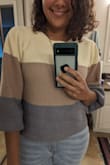 I must confess. My first reaction to this sweater was "Holy Moly, the sleeves are way too puffy!" I just needed a second look at it, though. I ended up loving it exactly because of it! I love its out-of-ordinary style, colors, and the quality of the fabric. - Beatriz N.
