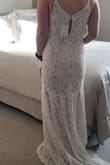 This is the style my daughter thought she wanted. It's pretty, but she chose another Lulu's dress (Love Everlasting). A Medium was a perfect fit. She didn't seem to like the two folds in the skirt where she thought it was odd. - Jennifer H.