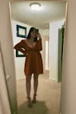 I ordered this dress for my anniversary date night with my husband and it was perfect! The color is so vibrant and the material is soft. The dress is very comfortable and makes the girls look great! You can tie the back as loose or tight as you'd like, which is helpful for support purposes. I'd definitely recommend it! - Alexis S.