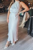 I wore this to my bridal shower and it was a show-stopper. I'm usually a large or 12 in other dresses so I usually buy XL on LuLus. It fits so nicely and elegant. - Stefanie L.