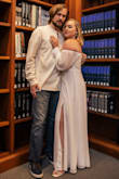 I wore this dress for one of my engagement photoshoot looks and LOVED it. I got it tailored, but I wouldn't have changed the size I ordered (L). The flowy and elegant look of this gown was exactly what I was looking for. I wore the Lulu's Simonee Off-White Lace-Up Heel Sandals with it to give myself some height and keep the classy look. All in all, I received so many compliments, and the pictures turned out perfect. - Emilie H.