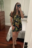 This dress is adorable and extremely flattering! I would probably go up a size so that you're comfortable, seeing as the material doesn't stretch much. Overall, it's a wonderful dress! - Alycia D.