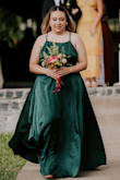 The dress was everything I needed. It was the exact size, I just had to hem it a little bit and make small alterations to the neckline because it was a bit loose on me (even after adjusting the straps). I loved the elastic in the back. It didn't feel constrictive or uncomfortable. The slit was a bit high for my height, but it looked great with my heels. Def loved the dress <3 - Debi R.