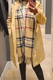 I ordered a S and had to return it because it fit too snugly around my arms. The exchange process was seamless and I received my M coat and I instantly fell in love. The coat is soft, incredibly warm, and excellent for layering. I got so many compliments! I highly recommend it. - Sylvia G.