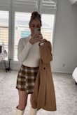 I love this skirt! A super pretty color combo. It looks great on, it's just super tight and short. Small is my normal size. It fits on the waist so I was torn about exchanging it for a medium. I just wish it had stretch for my hips. - Talia W.
