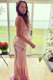 Fits true to size. It's a bit long for me but otherwise, it's perfect and stunning! - Erin B.