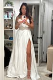 I purchased this as a blind buy for our elopement; it was the first wedding dress I'd ever tried on! I'm usually a size 8/10 but decided to size up bc of reviews. I have a small chest so I'll have to get it taken in a bit, and hemmed at the bottom, but overall, it's perfect! Looks like I got it at a bridal boutique! - Rachel Z.