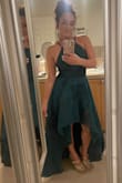 I first ordered a size small - my normal size. However, this material has absolutely no stretch. To get zipped over the bust, I needed to size up. I'd suggest that larger busted girlies size up. The dress is so beautiful. The color (green) is vibrant. I'm in love with this dress. (Pic is right out of the bag, not pressed and will need some length taken off) - Jeri C.