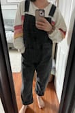 I have tried other long overalls and never quite liked the look or feel of them on me. These are the first that fit right & are so comfortable! They are a bit looser which helps I'm sure, the material is also very soft and you can move in it. The leg part is a bit wider than I would like, however, I think it really works. Any closer to the leg and it would probably not look right. I am typically a S/M and ordered S. Currently postpartum 3 months and the S fits amazing with a lot of nice wiggle room. The black color is so nice and def goes with everything. These will be a staple in my wardrobe - highly recommend them if you're on the fence. - Alyssa L.