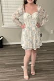 The dress is really cute but VERY large in the chest. I am normally a XS-S however the top of the dress fits more like a M-L. The dress also has gold detailing that I wasn't expecting. - Sierra B.